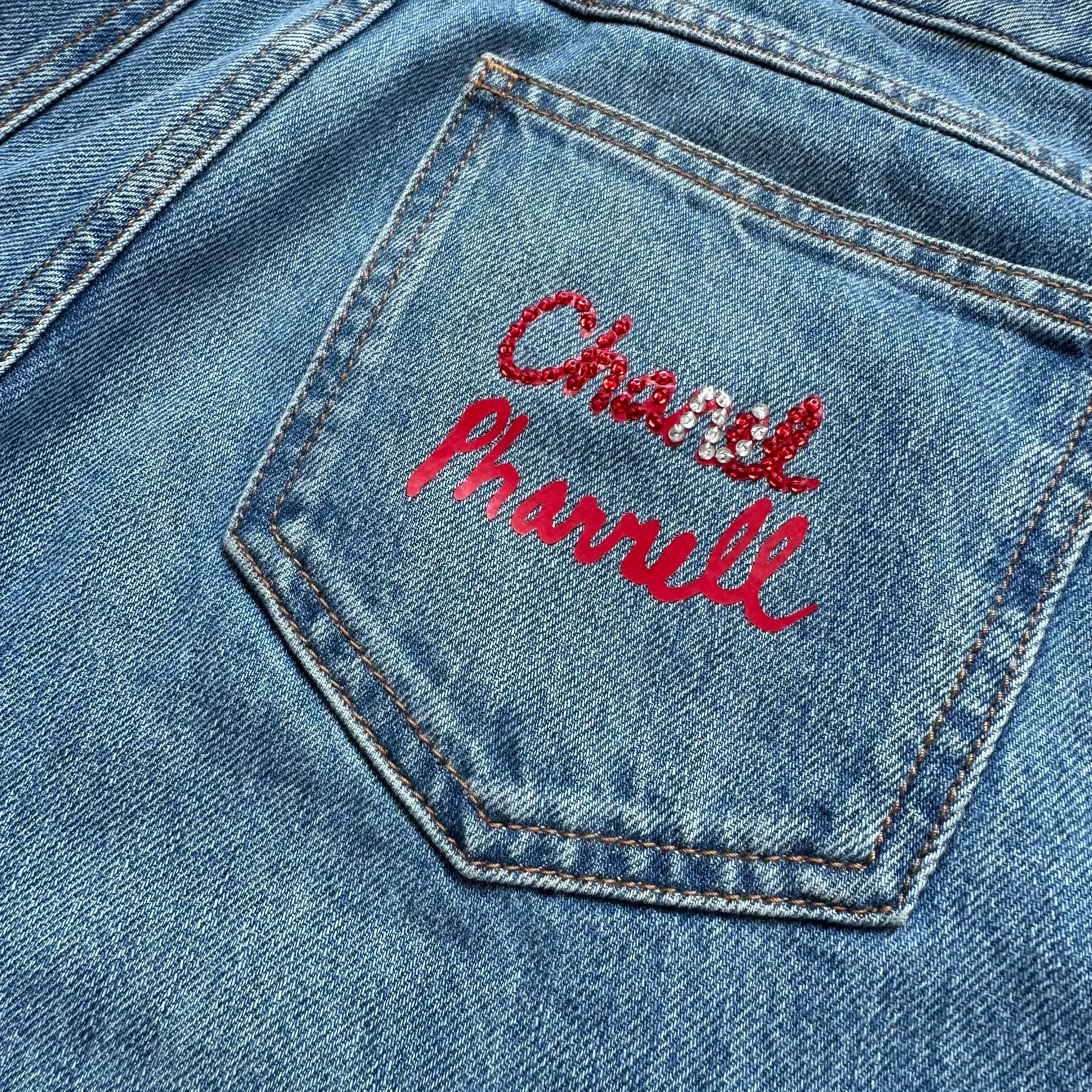 CHANEL - DENIM BLUE JEANS WITH PHARREL RED LOGO ON BACK POCKET SIZE 34 FR