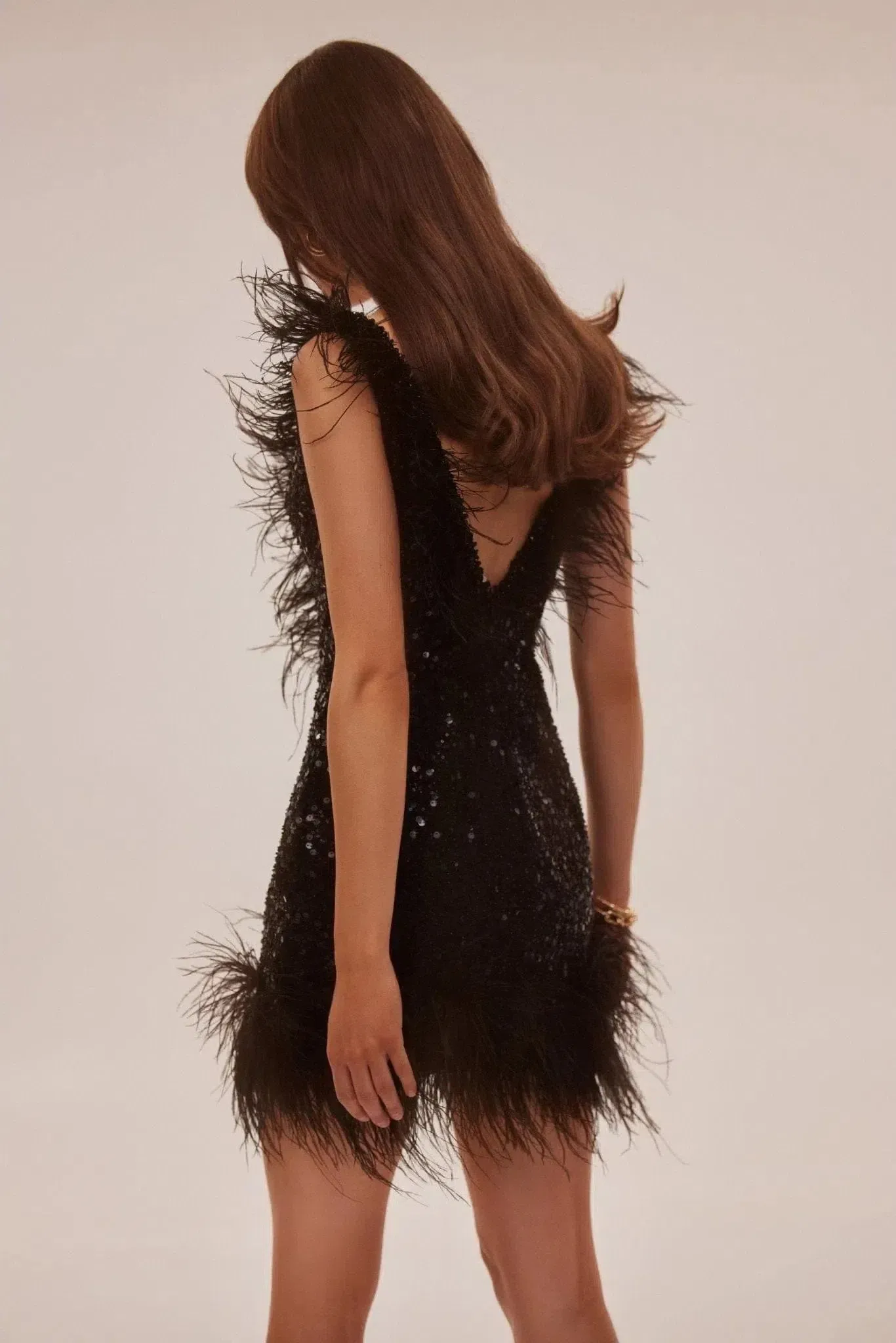 Elizara – Feather trim – Bold sequin dress