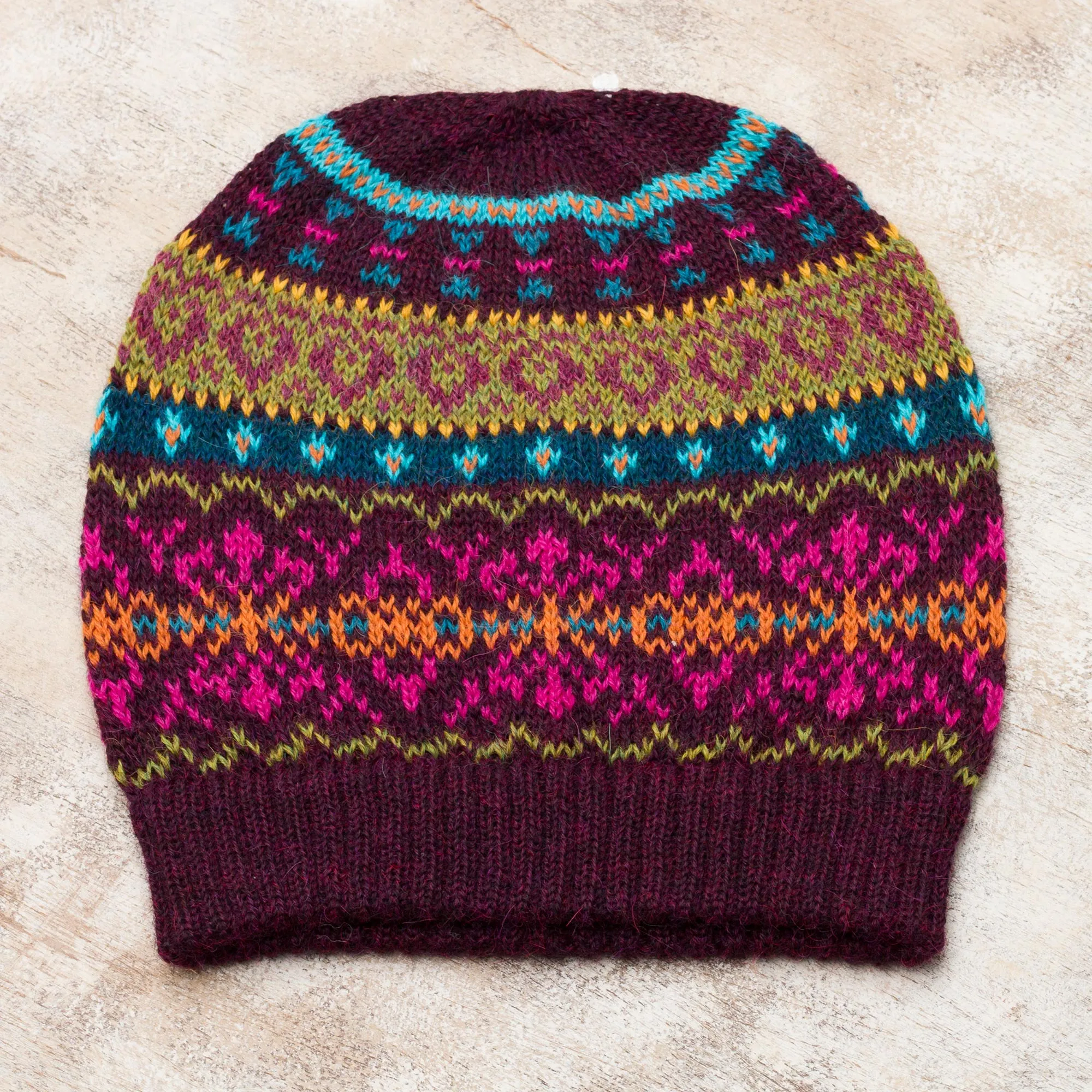 Multi-Color 100% Alpaca Knit Hat with Rows of Varying Motifs - Colorful Carousel | NOVICA