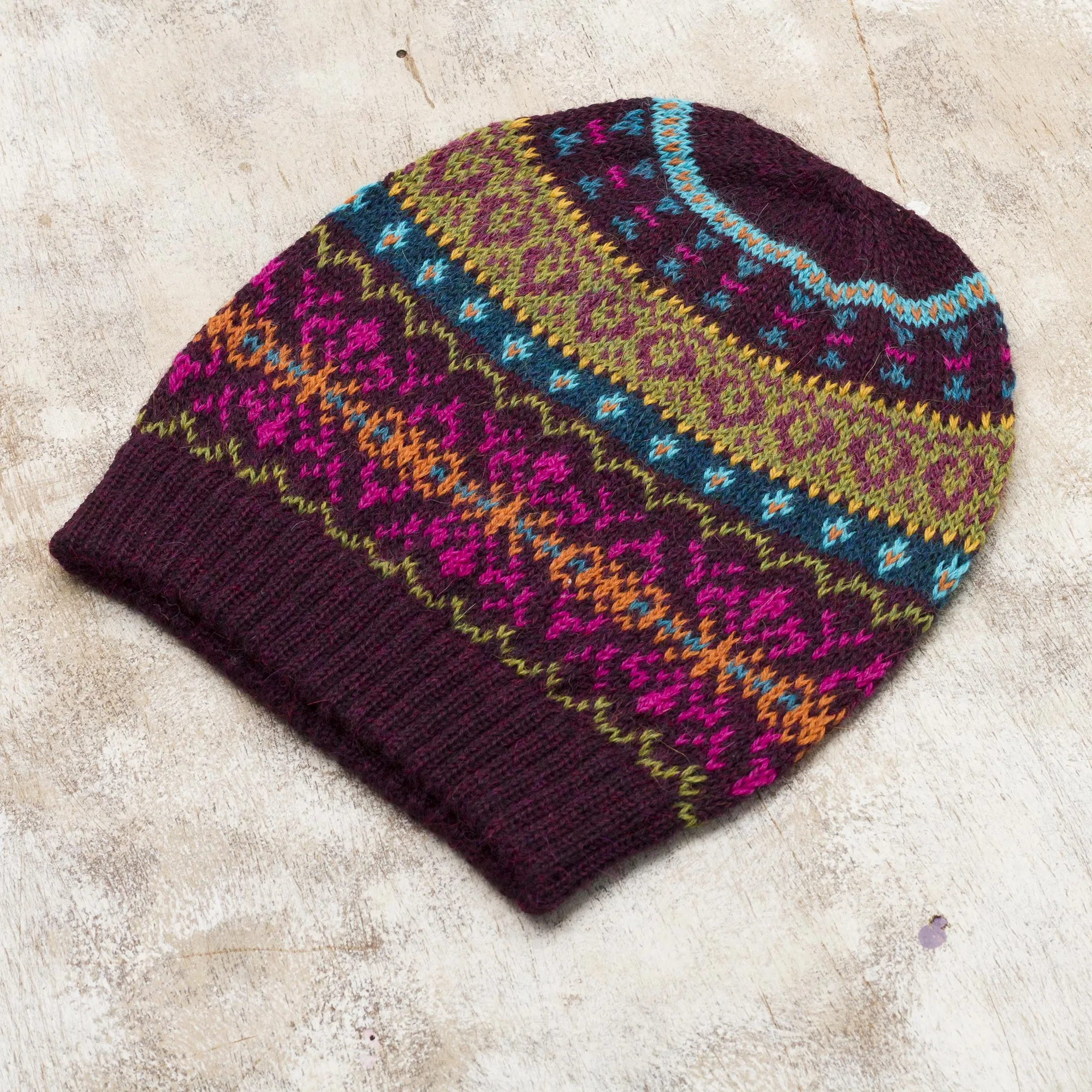 Multi-Color 100% Alpaca Knit Hat with Rows of Varying Motifs - Colorful Carousel | NOVICA