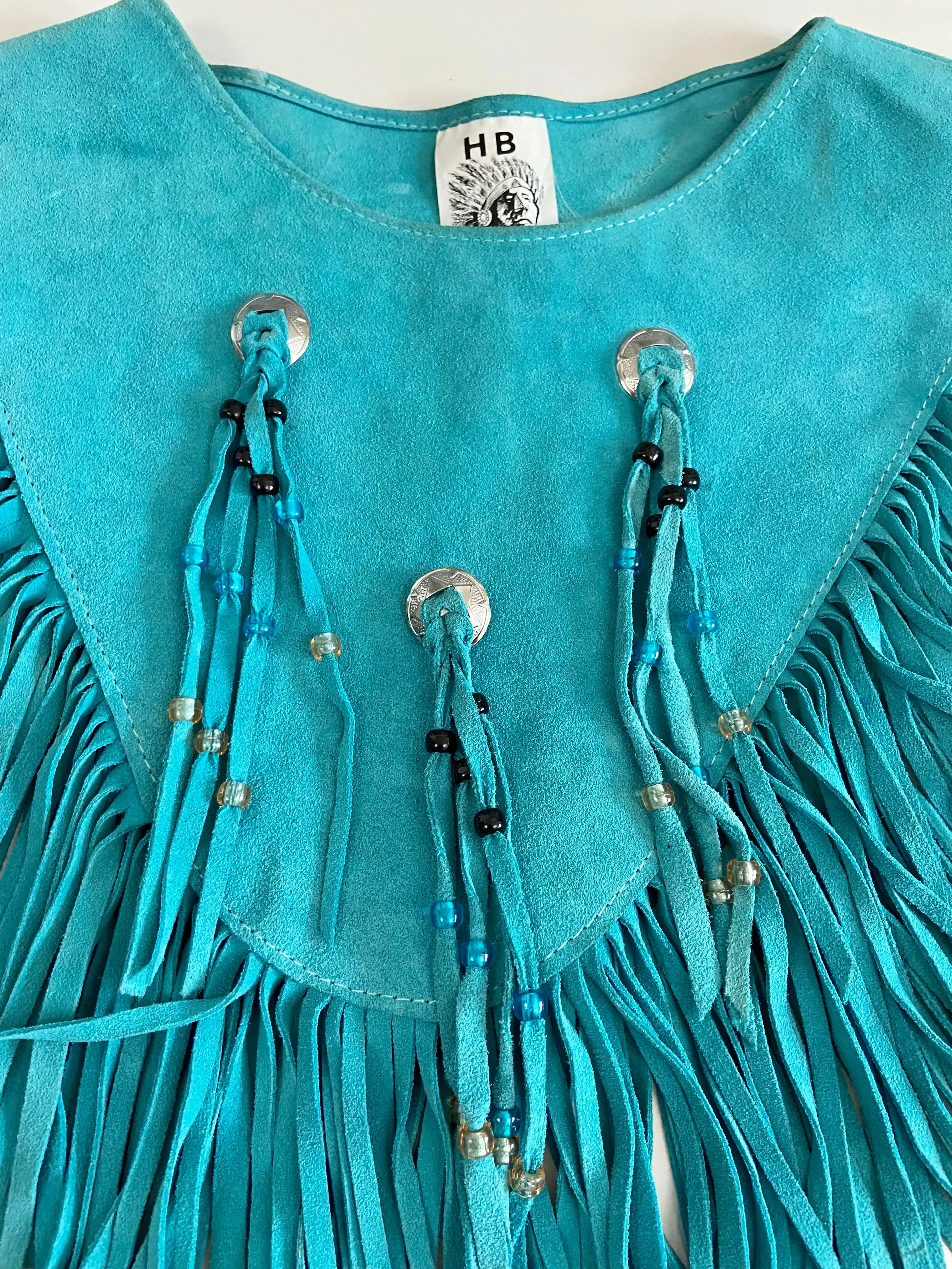 Turquoise suede leather poncho